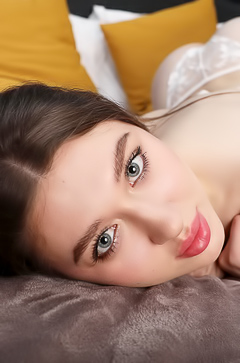 Miss Sunset Flirts With Camera Through Delicate Lingerie