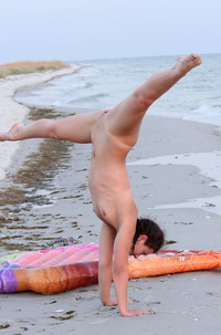 Melina D. Spreading Legs On The Beach