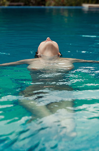 Busty Beauty Mila Azul Swimming Nude