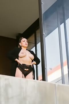 Sophia Grey elegantly reveals her big breasts and sexy figure