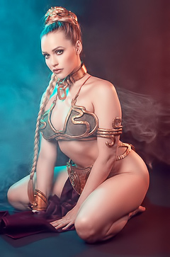 Mia Malkova displays her busty ass and enhanced boobs