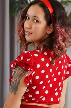 Kora Peels The Polka Wrap After The Red Mini