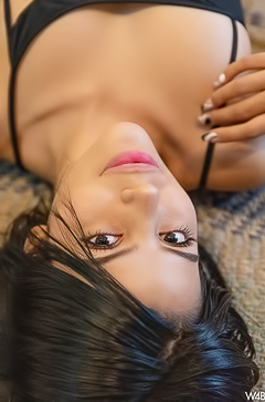 Salome tempts with a whispered command from the shadows